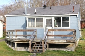 SOLD  204 HAMLIN ST., CORBIN | Two bdrm frame home, living rm, eat-in-kitchen, bath, front porch & rear deck.