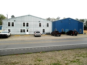 Sold! Commercial property: Equipment repair, storage and office space.