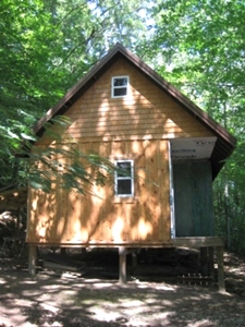 SOLD! HWY 1804, WMSBG WANT TO GO OFF THE GRID? CHECK OUT THIS 14 ACRES +/-: PARTIALLY FINISHED CABIN INCLUDED