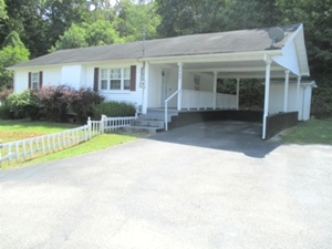 Sold 1460 Hwy 25W, Wmsbg | A two bedrooms, one bath, eat-in-kitchen, living room, laundry room, and a large walk in closet
